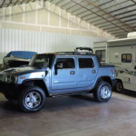 Indoor storage with RV, hummer and boat