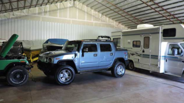 Indoor storage with RV, hummer and boat